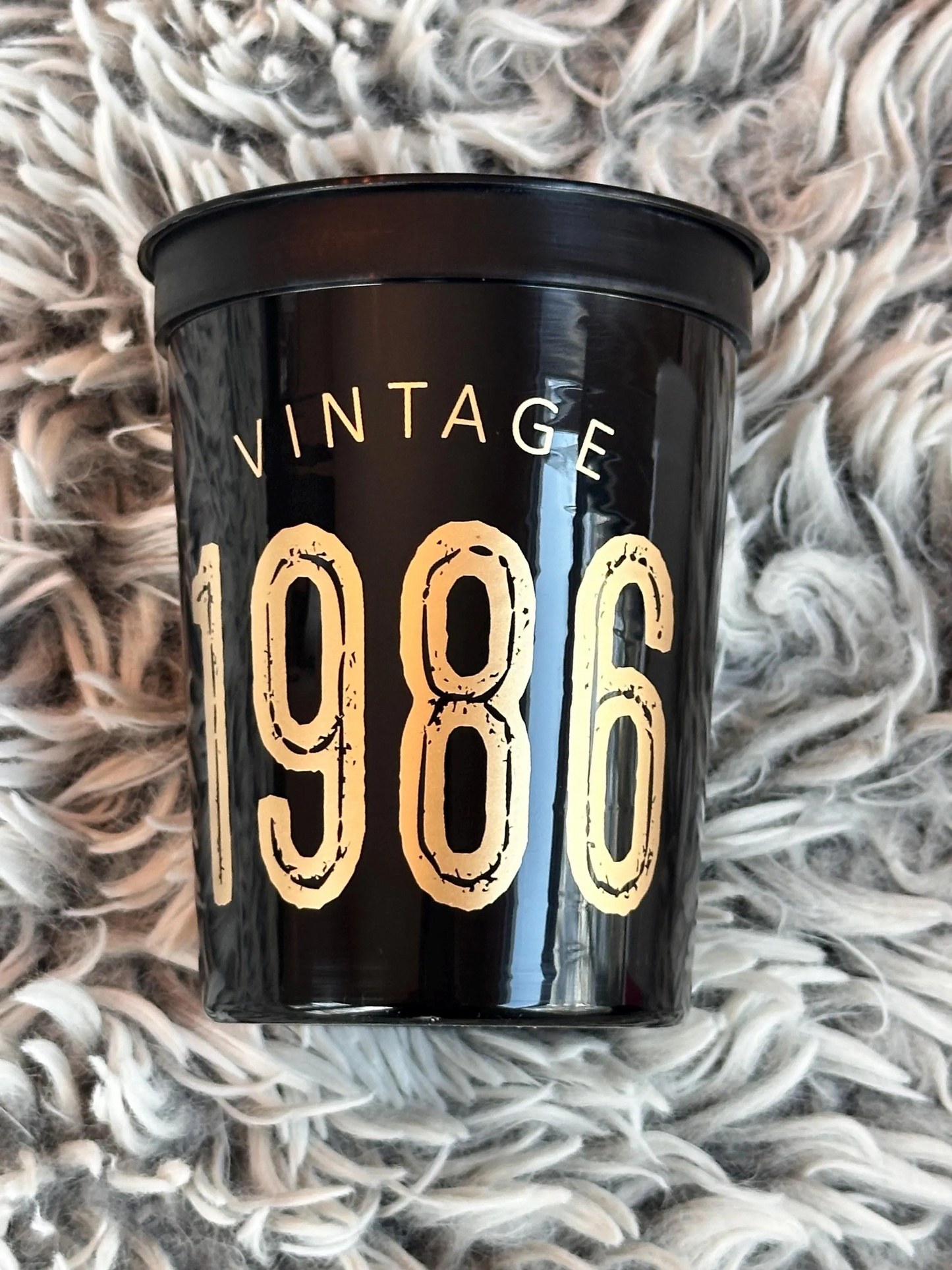 Vintage 1986 stadium cups black with gold text