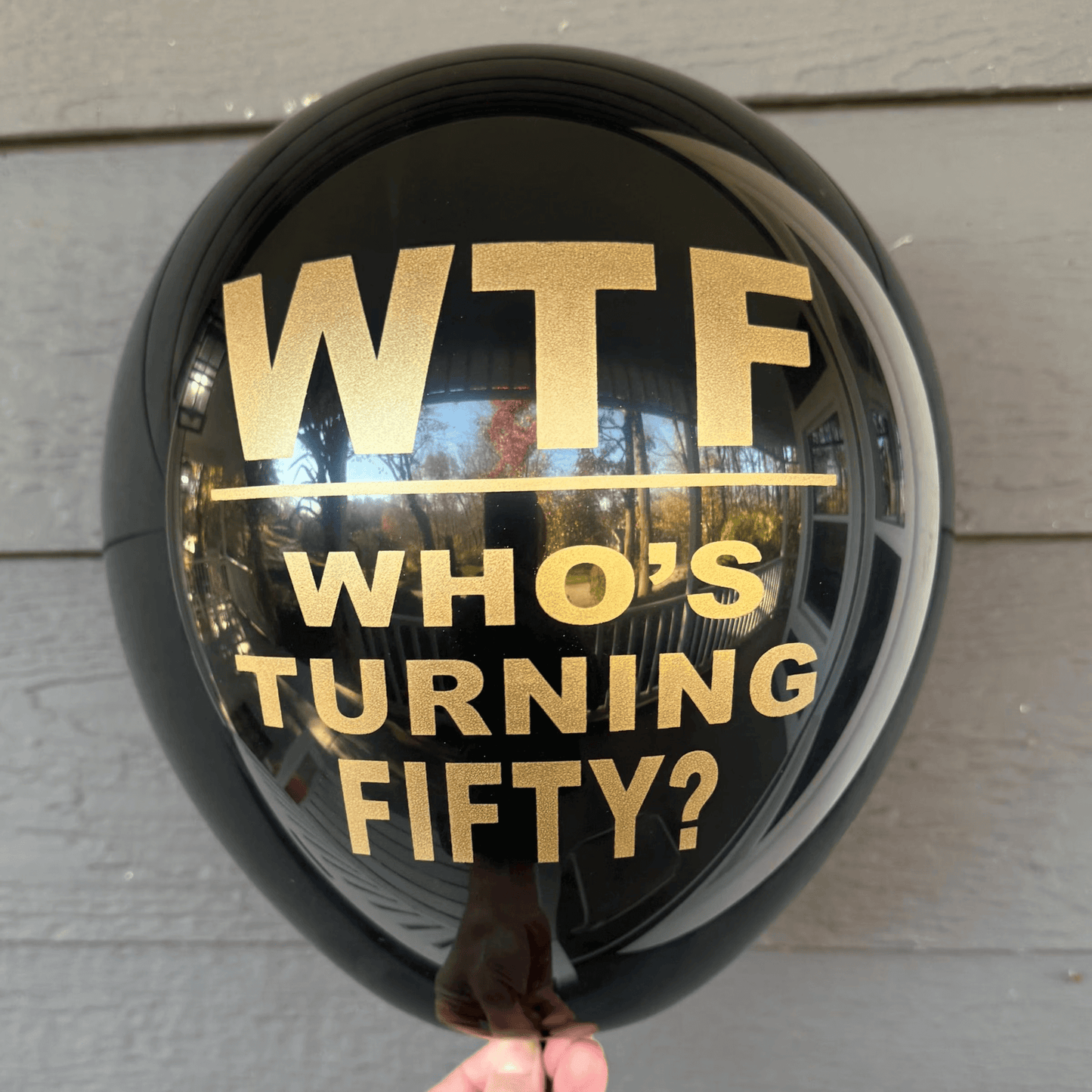 WTF Who’s Turning Fifty Balloons black with gold text