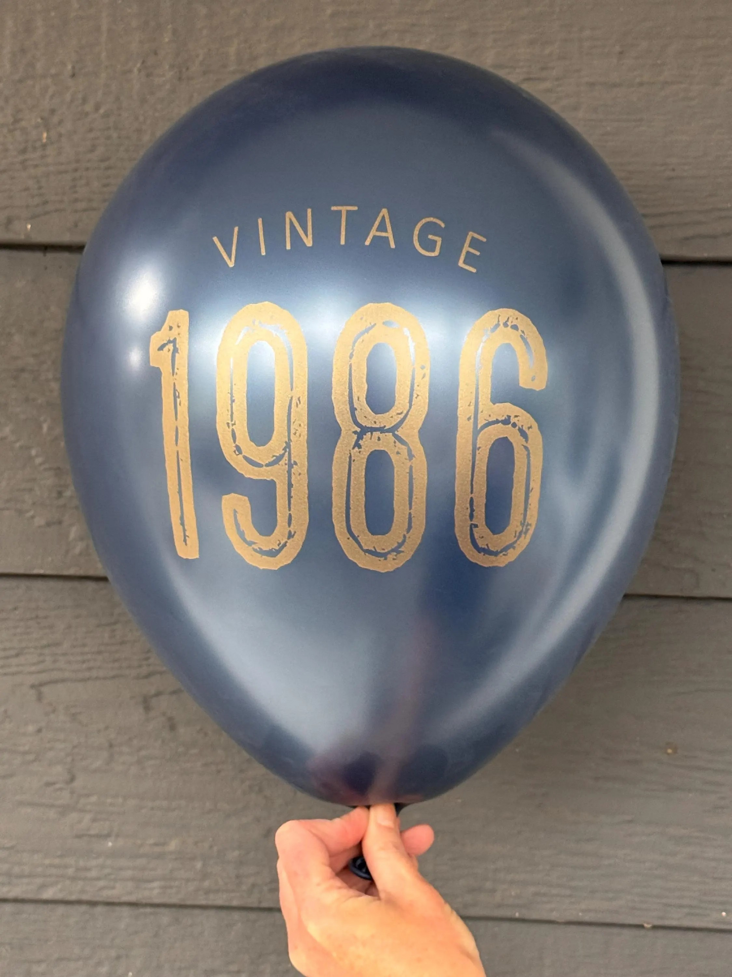 40th Birthday Balloons Navy latex balloon with gold lettering reading Vintage 1986