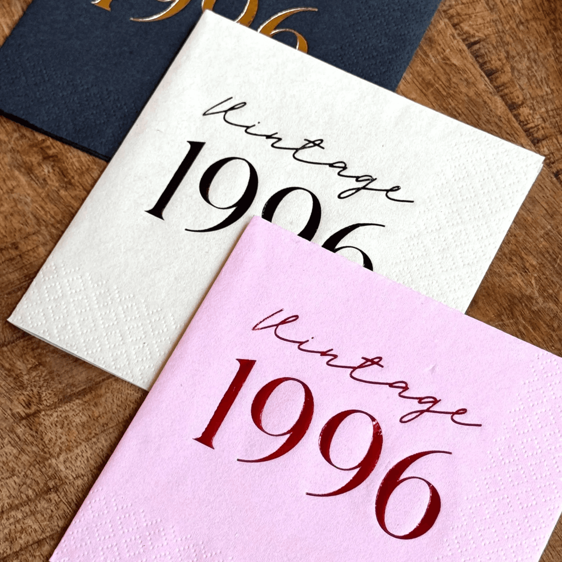 Vintage 1996 cocktail napkins in navy, white, and pink for a 30th birthday