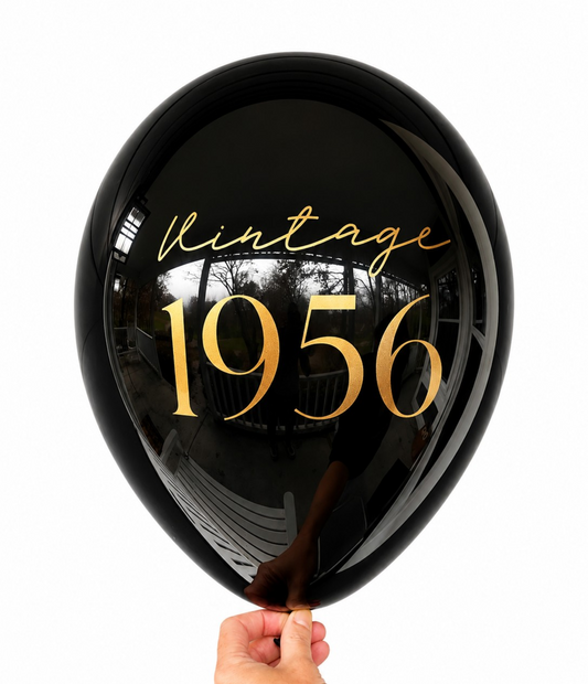 70th Birthday Balloons.  The balloon is black with gold text and reads Vintage 1956.  Perfect 70th Birthday decorations