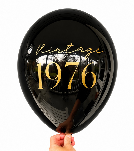 50th Birthday Balloons.  The balloon is black with gold font.  The balloon reads Vintage 1976 in gold.  Perfect 50th Birthday Decorations for a 50th Party