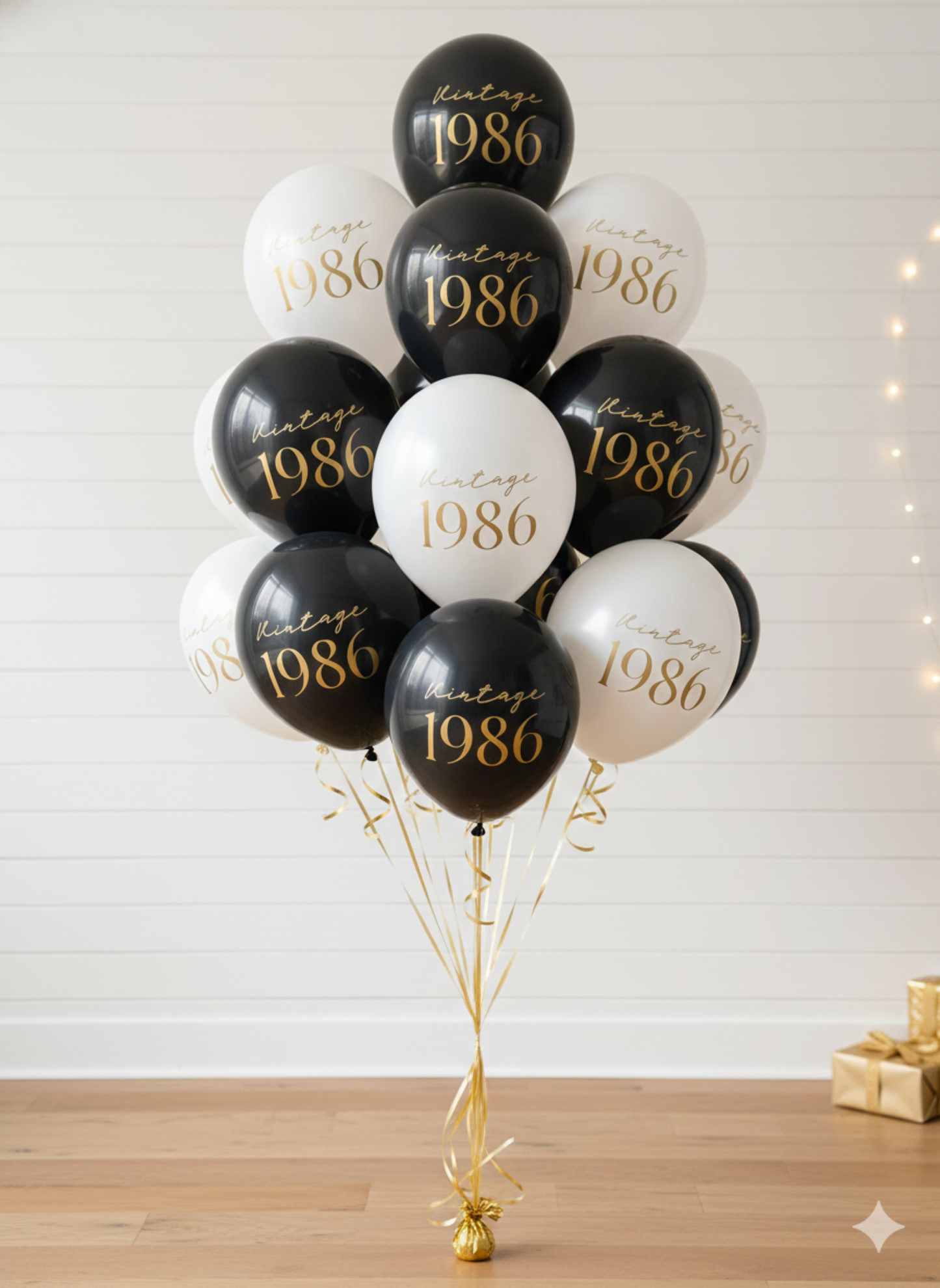 Bouquet of balloons with 'Vintage 1986' text on a white background