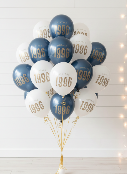 Bouquet of balloons with '1996' printed on them against a white background.