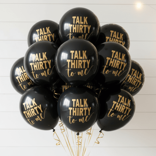 30th Birthday Balloons Black balloons with 'Talk Thirty to Me' text on a white background