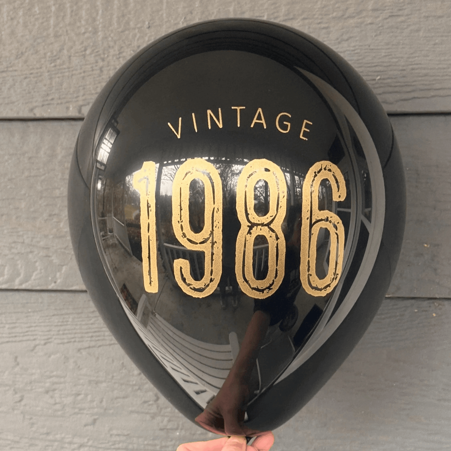 40th Birthday Balloons Black latex balloon with gold lettering reading Vintage 1986