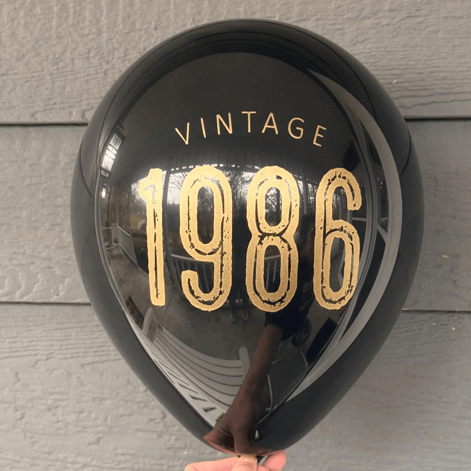 40th Birthday Balloons Black latex balloon with gold lettering reading Vintage 1986