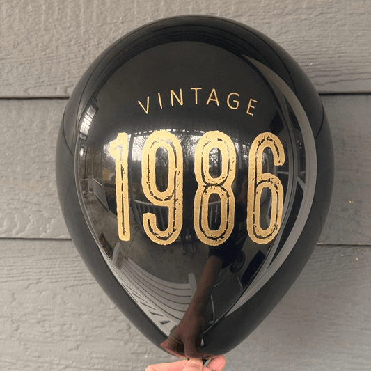 40th Birthday Balloons Black latex balloon with gold lettering reading Vintage 1986