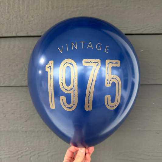 Vintage 1975 Balloons – Bold 50th Birthday Party Decor in White, Navy, and Black