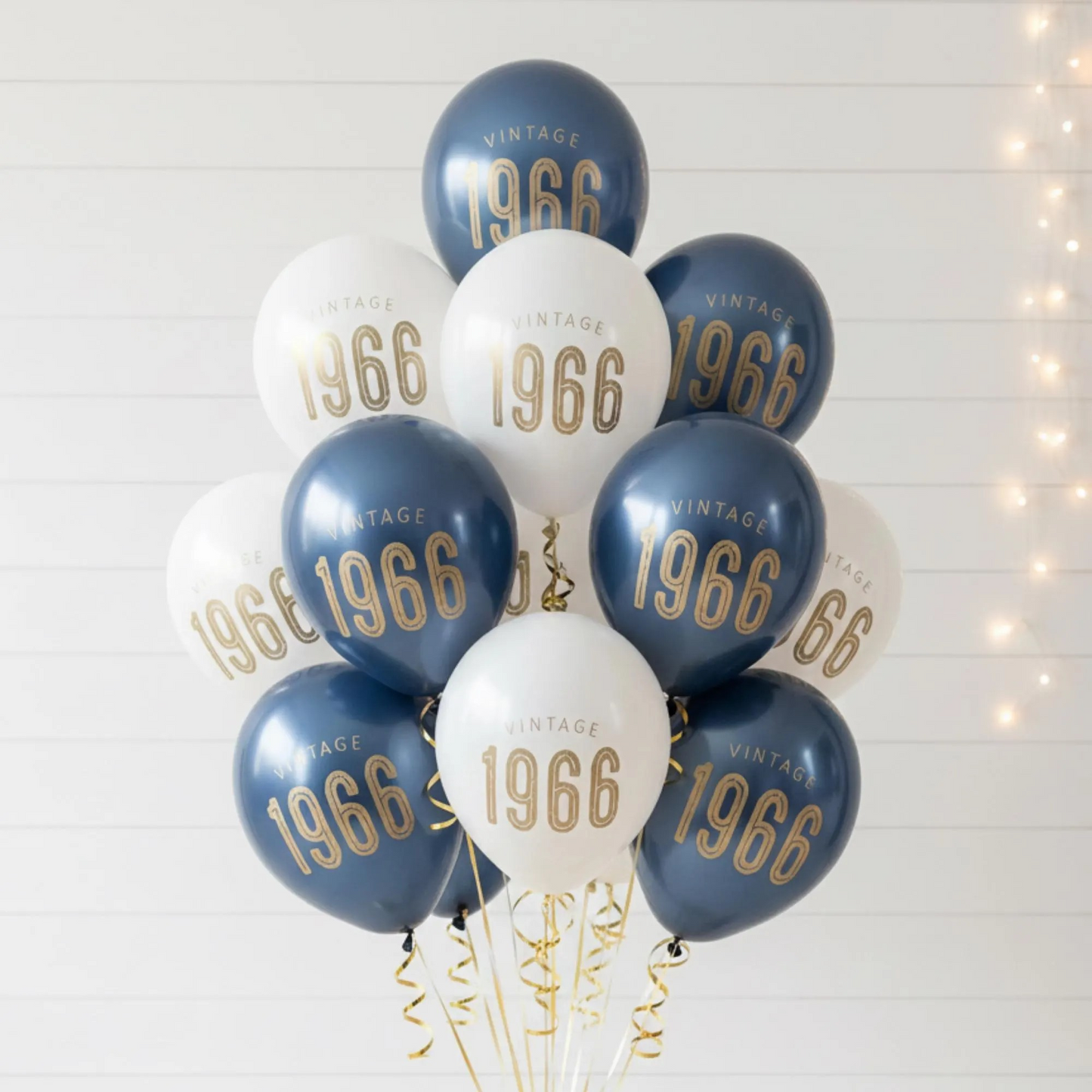 60th Birthday Balloons Navy and white with gold font.  The balloons are latex and read Vintage 1966 in gold metallic font.