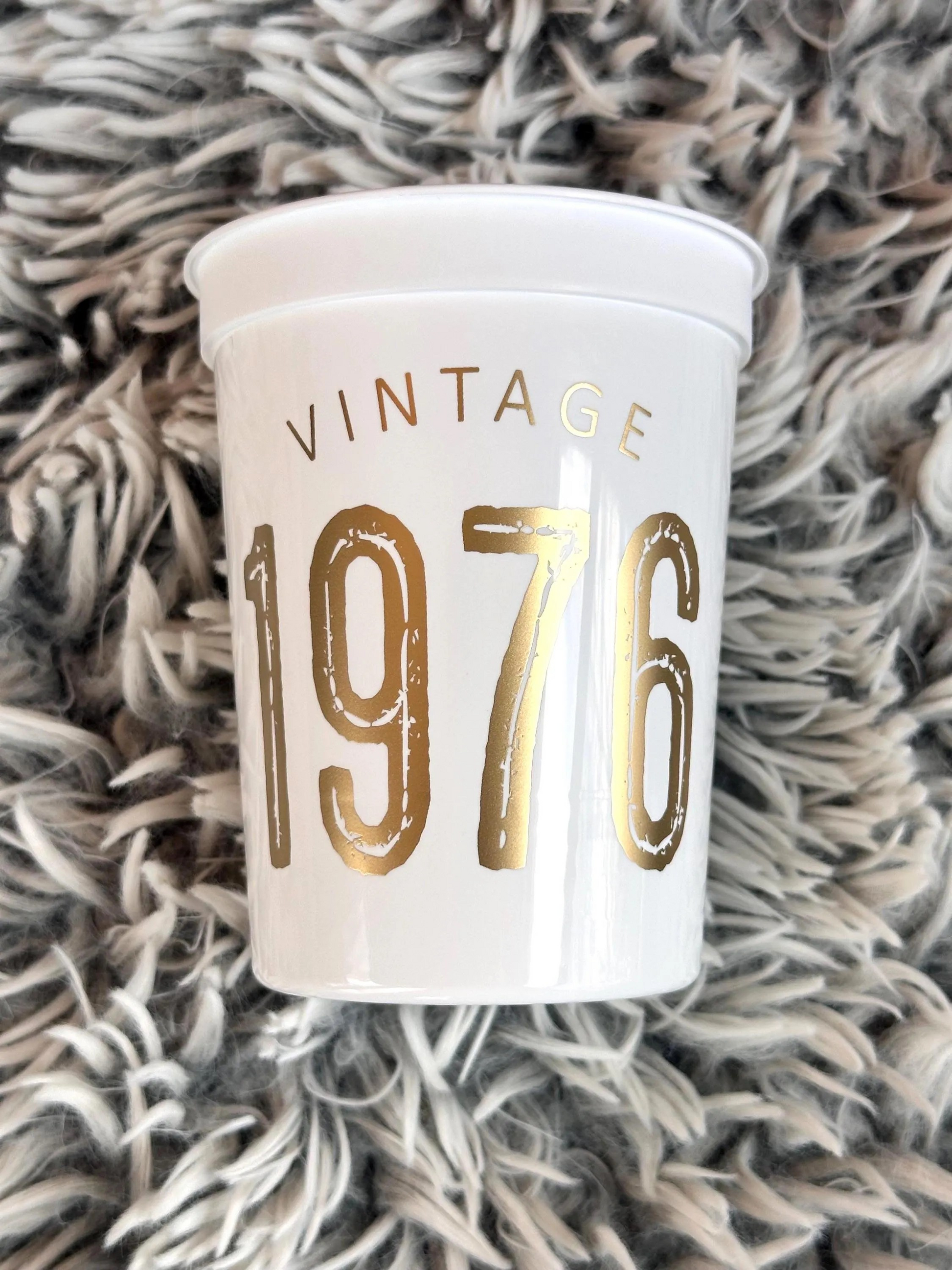 Vintage 1976 stadium cups white with gold text