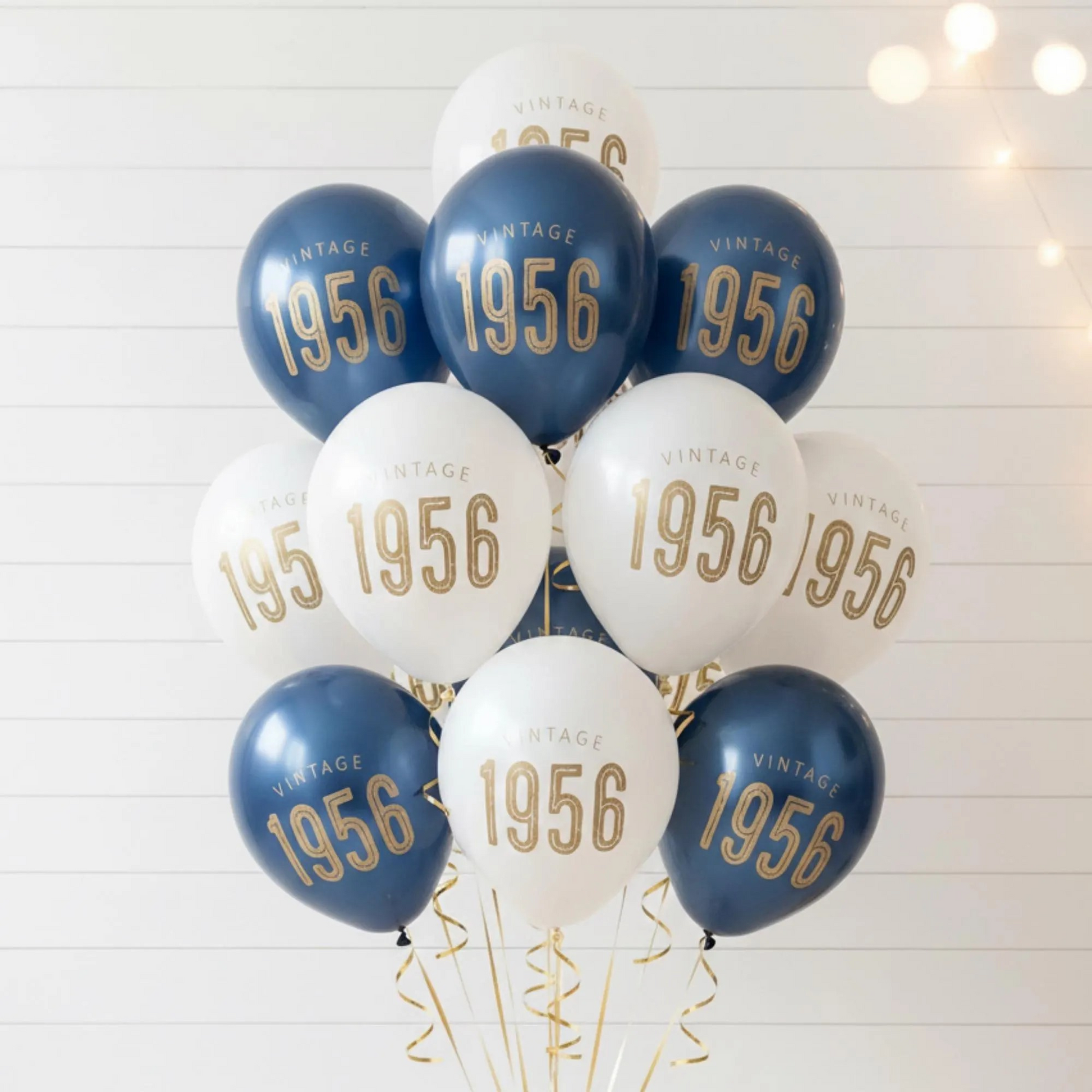 70th Birthday Balloons Navy and white latex.  The balloons read Vintage 1956 in gold font.