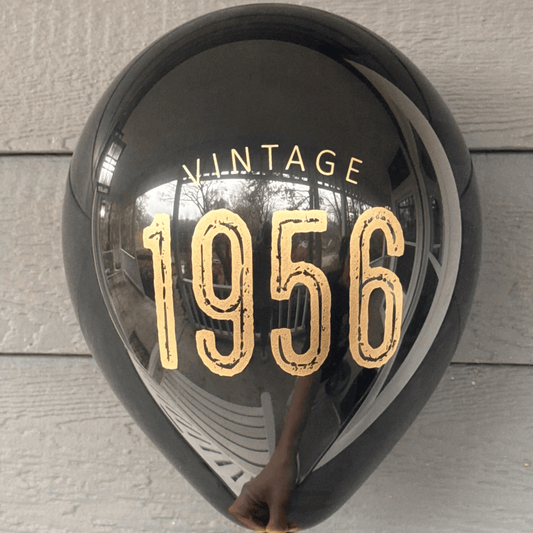 Black 70th Birthday Balloons with Vintage 1956 in gold lettering