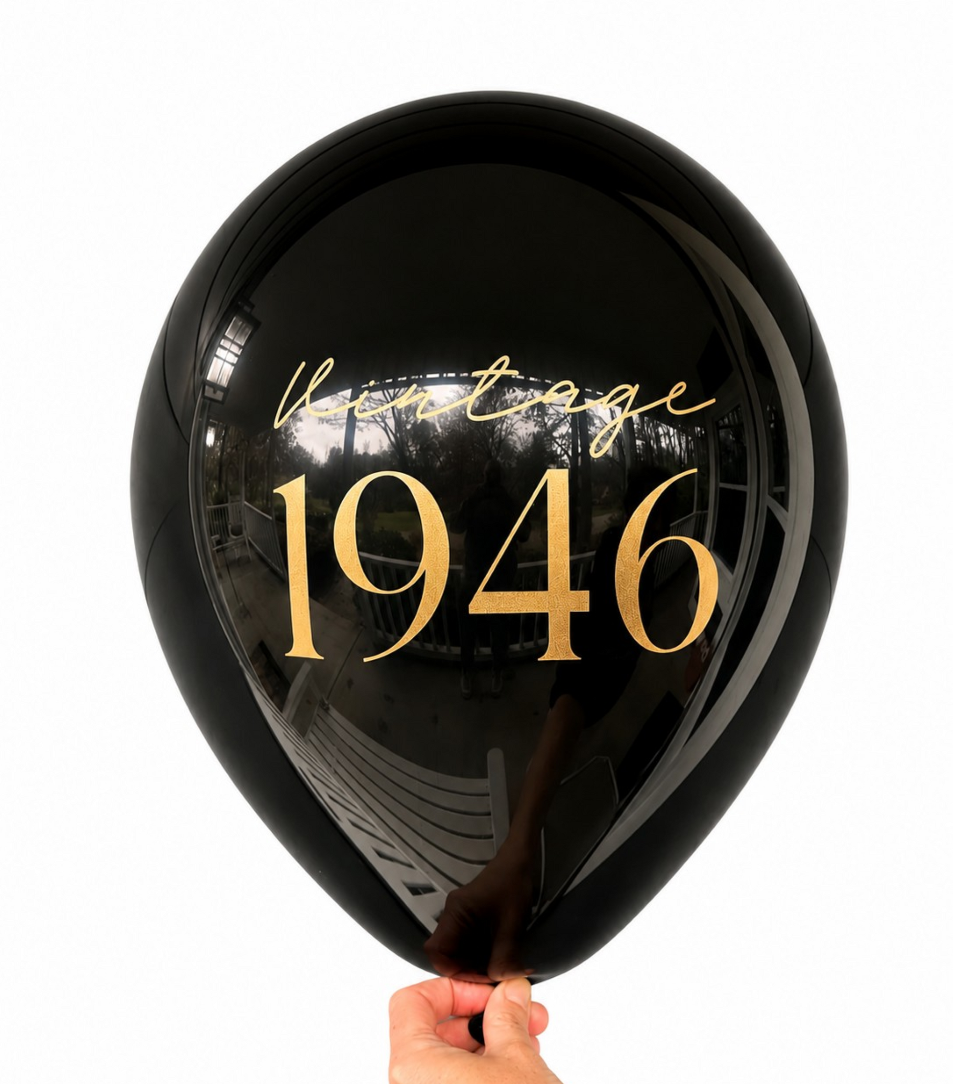80th Birthday Balloons.  The balloon is black with gold font and reads Vintage 1946.  Perfect 80th Birthday Decorations