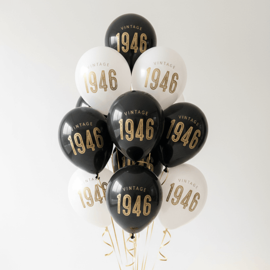 80th Birthday Balloons Black and White with gold lettering reading Vintage 1946