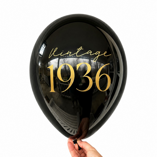 90th Birthday Balloon.  The balloon is black with gold text and reads Vintage 1936.  Perfect 90th Birthday Decorations