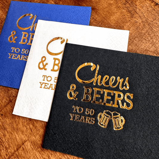 Cheers and Beers to 50 Years cocktail napkins foil stamped in gold