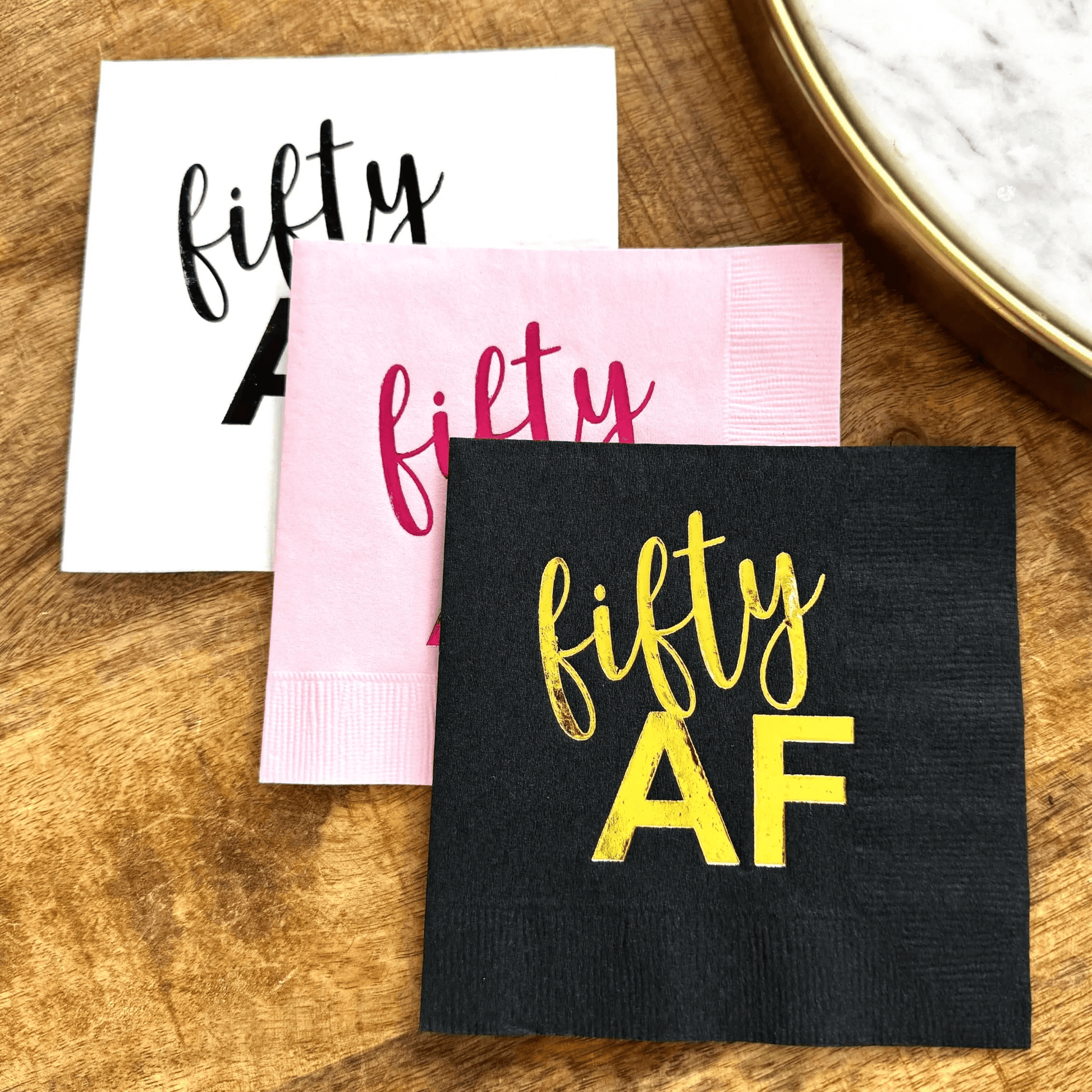 Fifty AF cocktail napkins foil stamped