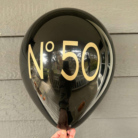 No 50 Couture balloons black latex with gold text