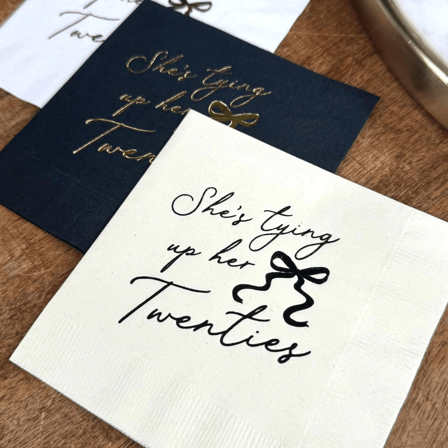 Shes Tying Up Her Twenties cocktail napkins foil stamped