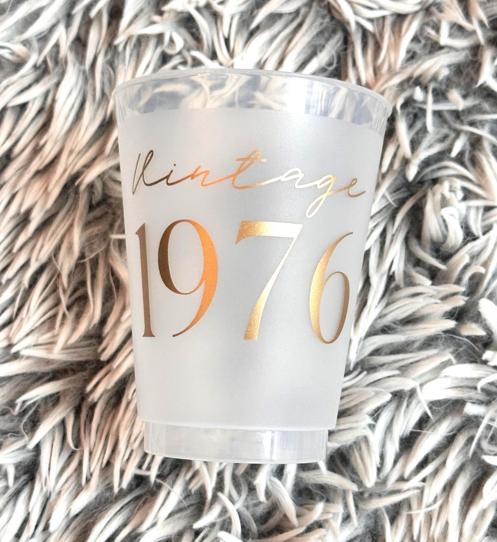 Vintage 1976 frosted cups in black and gold text 16-ounce 50th Birthday Cups