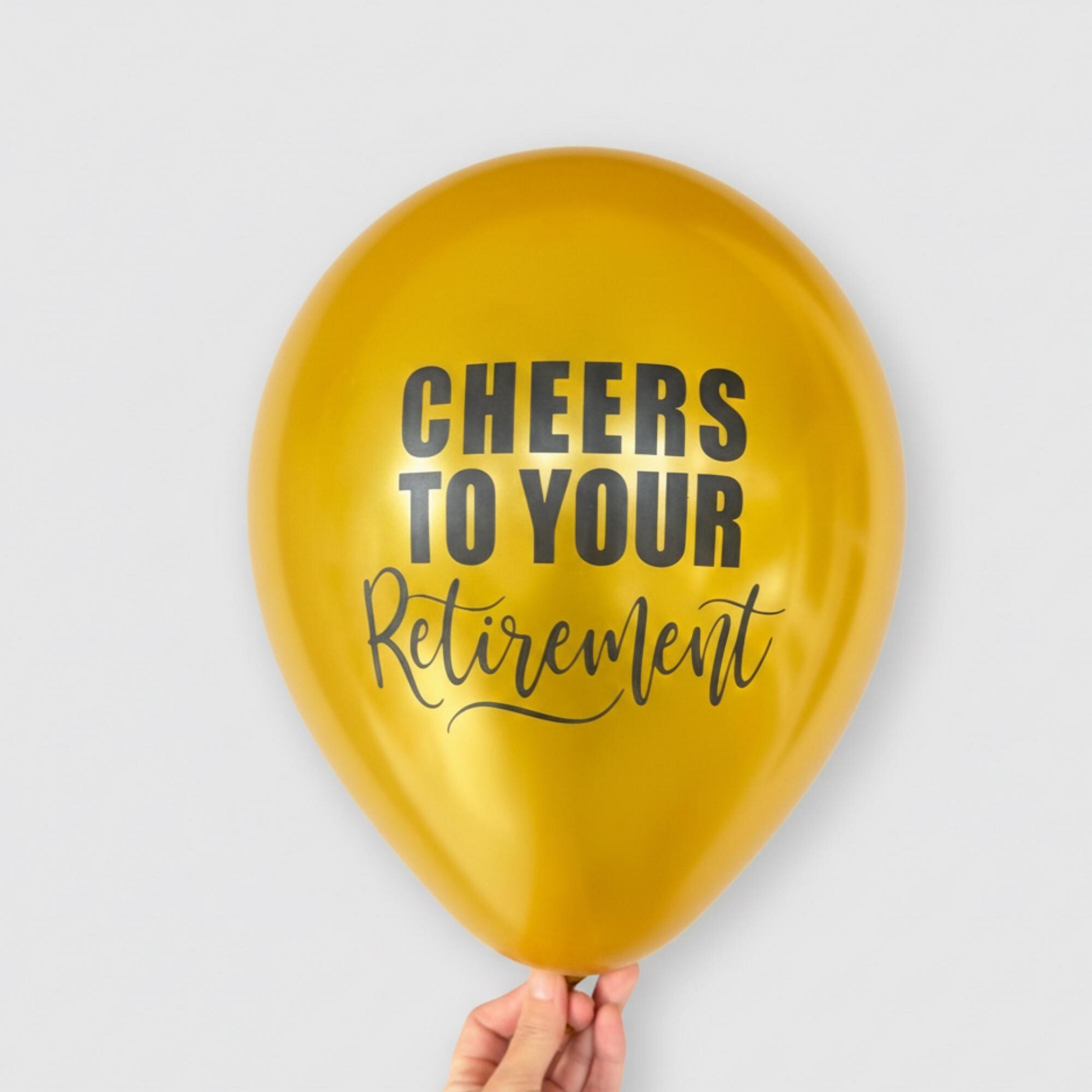 Cheers to your retirement balloons gold with black text.