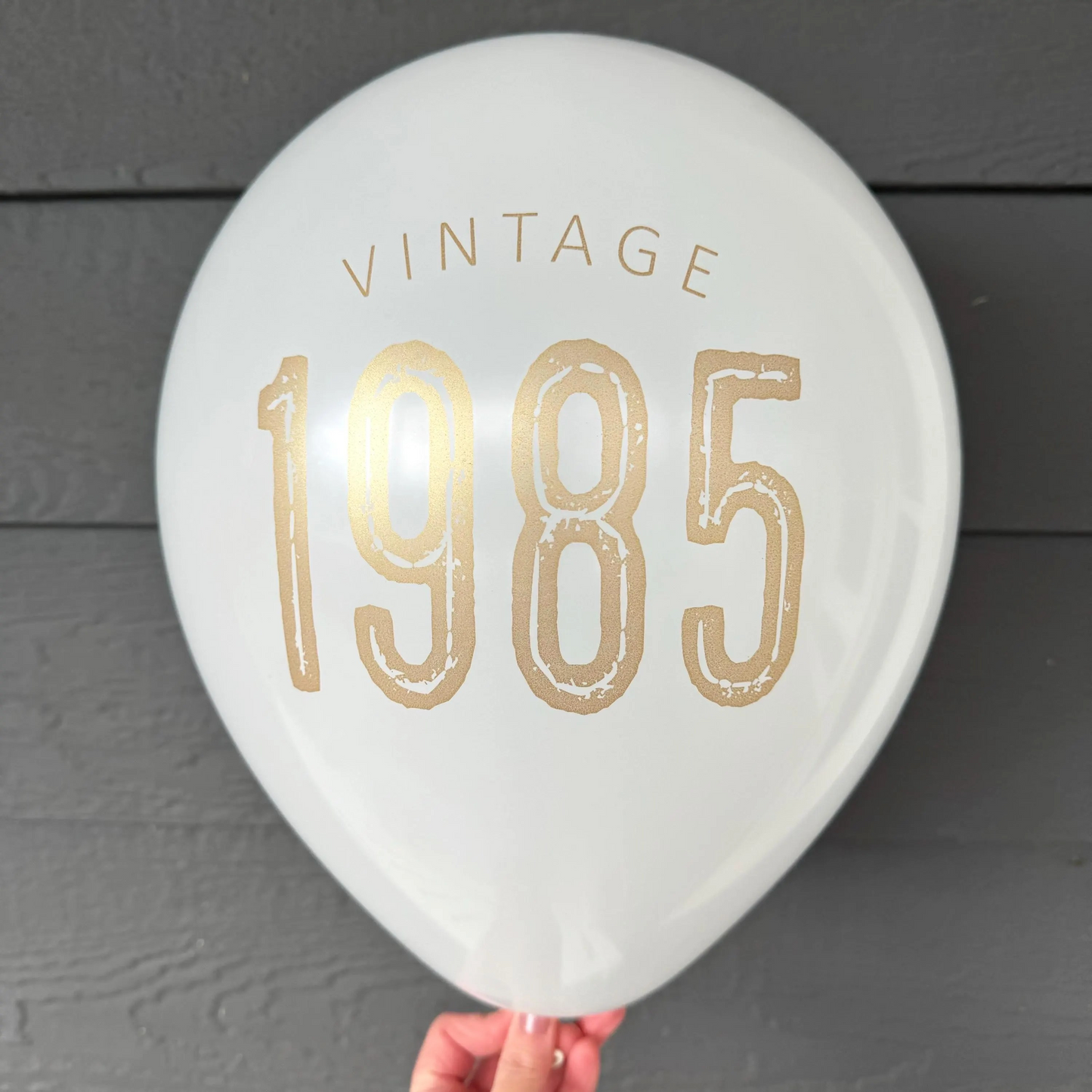 Vintage 1985 Balloons – Bold 40th Birthday Party Decor in White, Navy, and Black