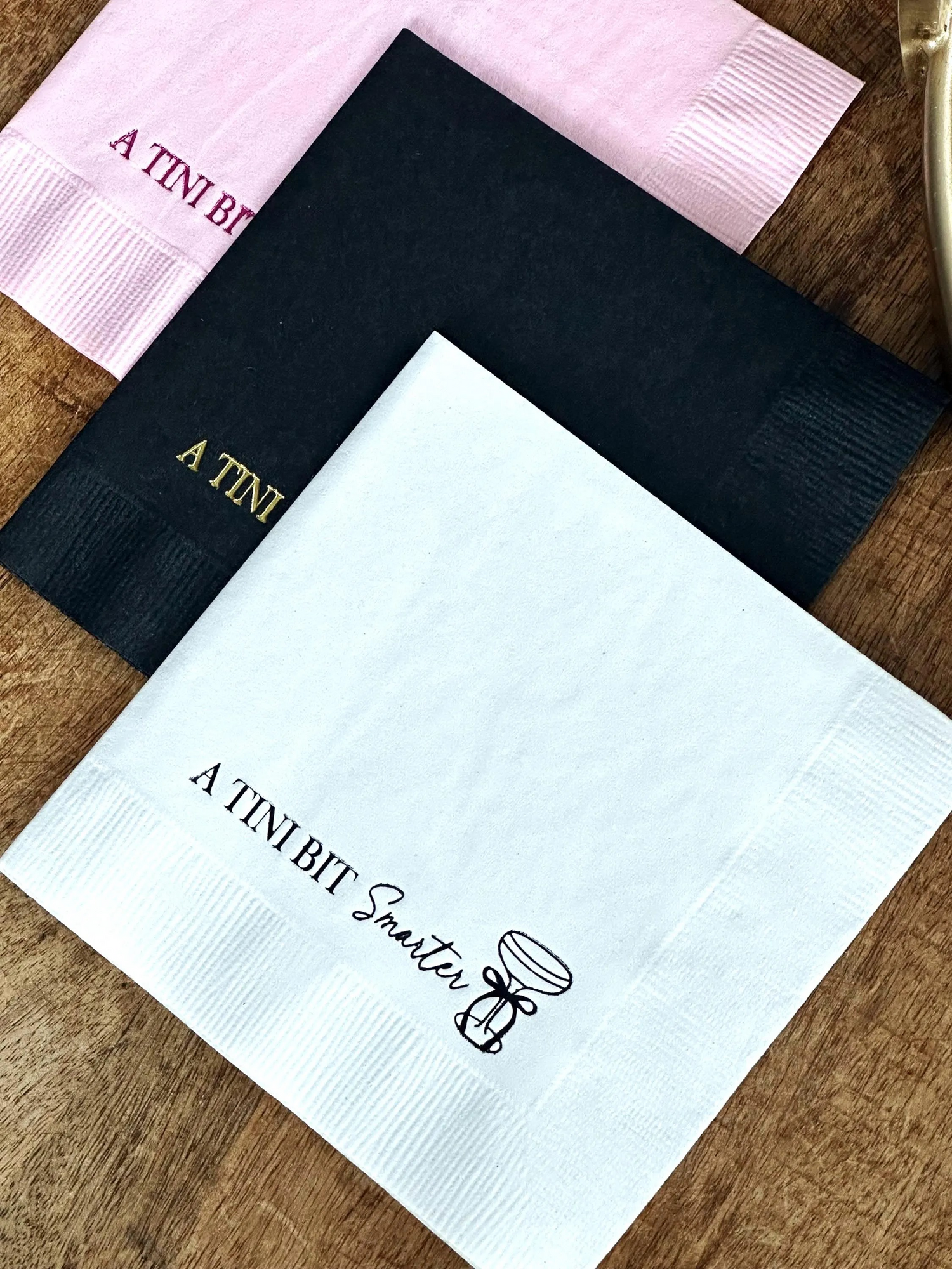 black, white and pink napkins that read a tini bit smarter with a martini with a bow.
Graduation Napkins