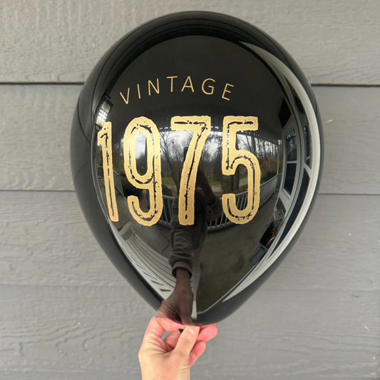 Vintage 1975 Balloons – Bold 50th Birthday Party Decor in White, Navy, and Black