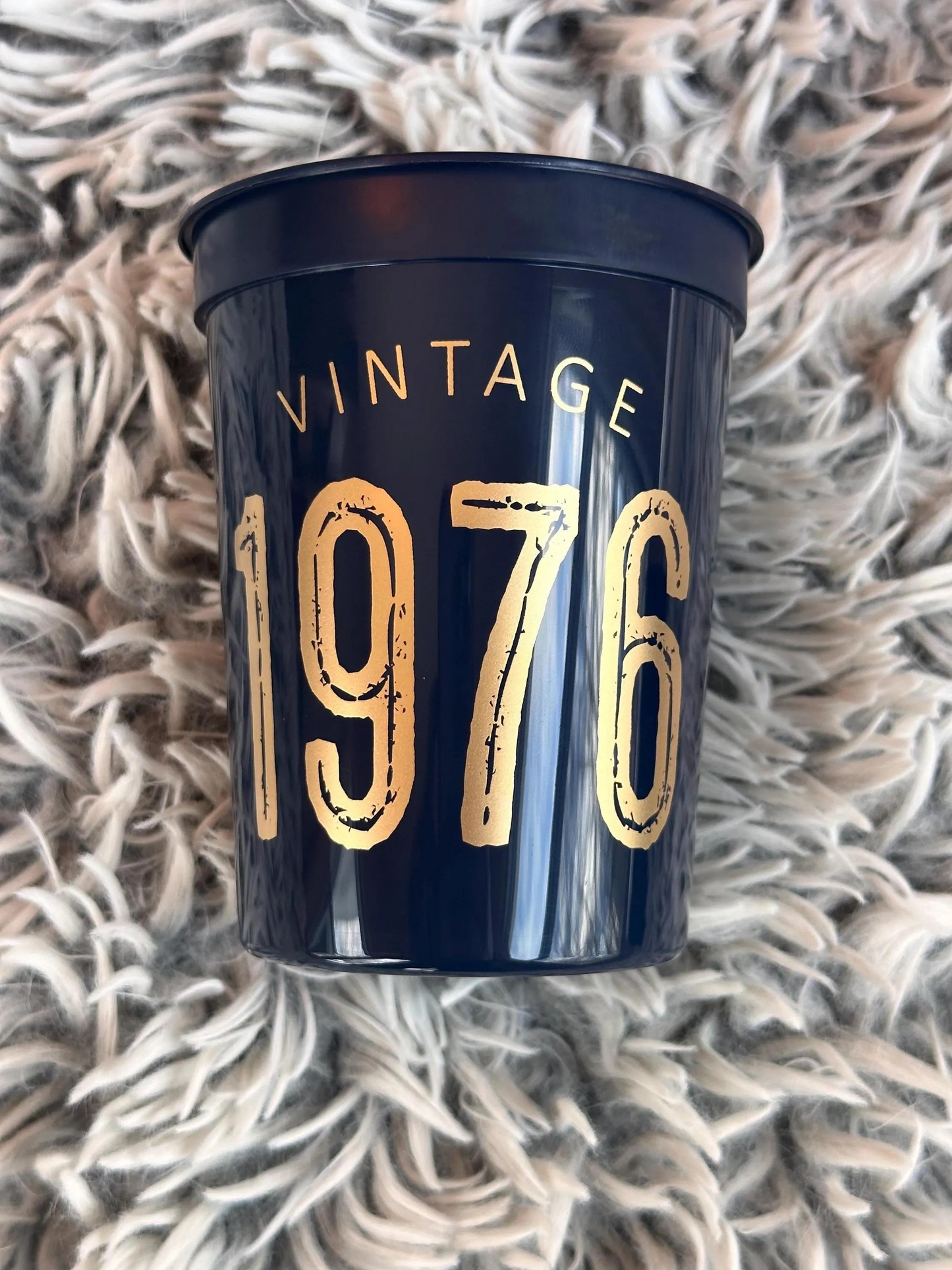 Vintage 1976 stadium cups navy with gold text