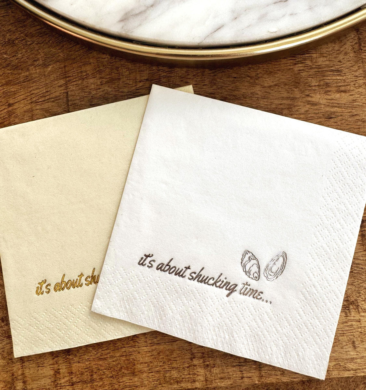 Foil Stamped Cocktail Napkins that read It's about shucking time with oyster shells.  Nautical Wedding Napkins