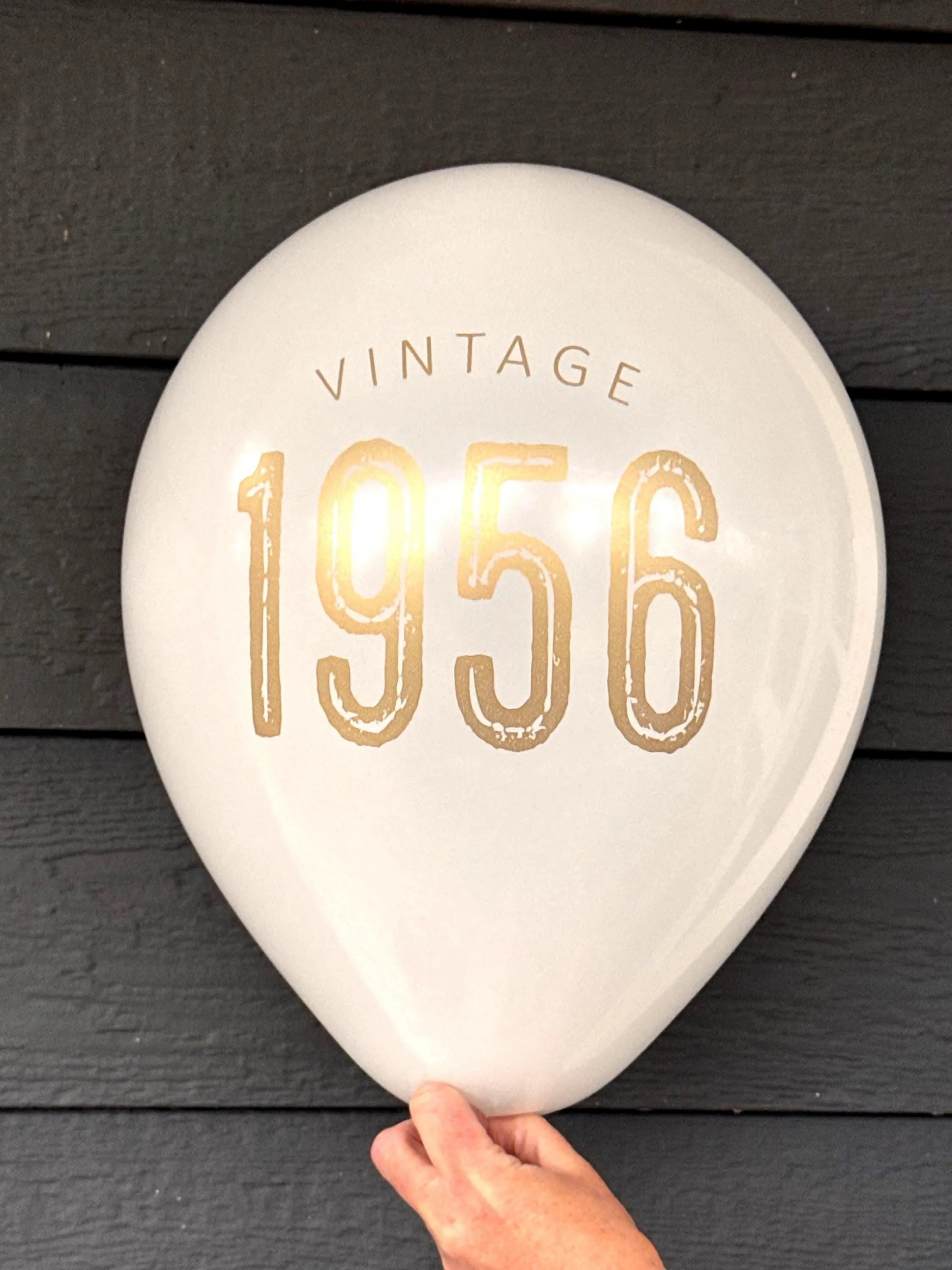 White 70th Birthday Balloons with Vintage 1956 in gold lettering