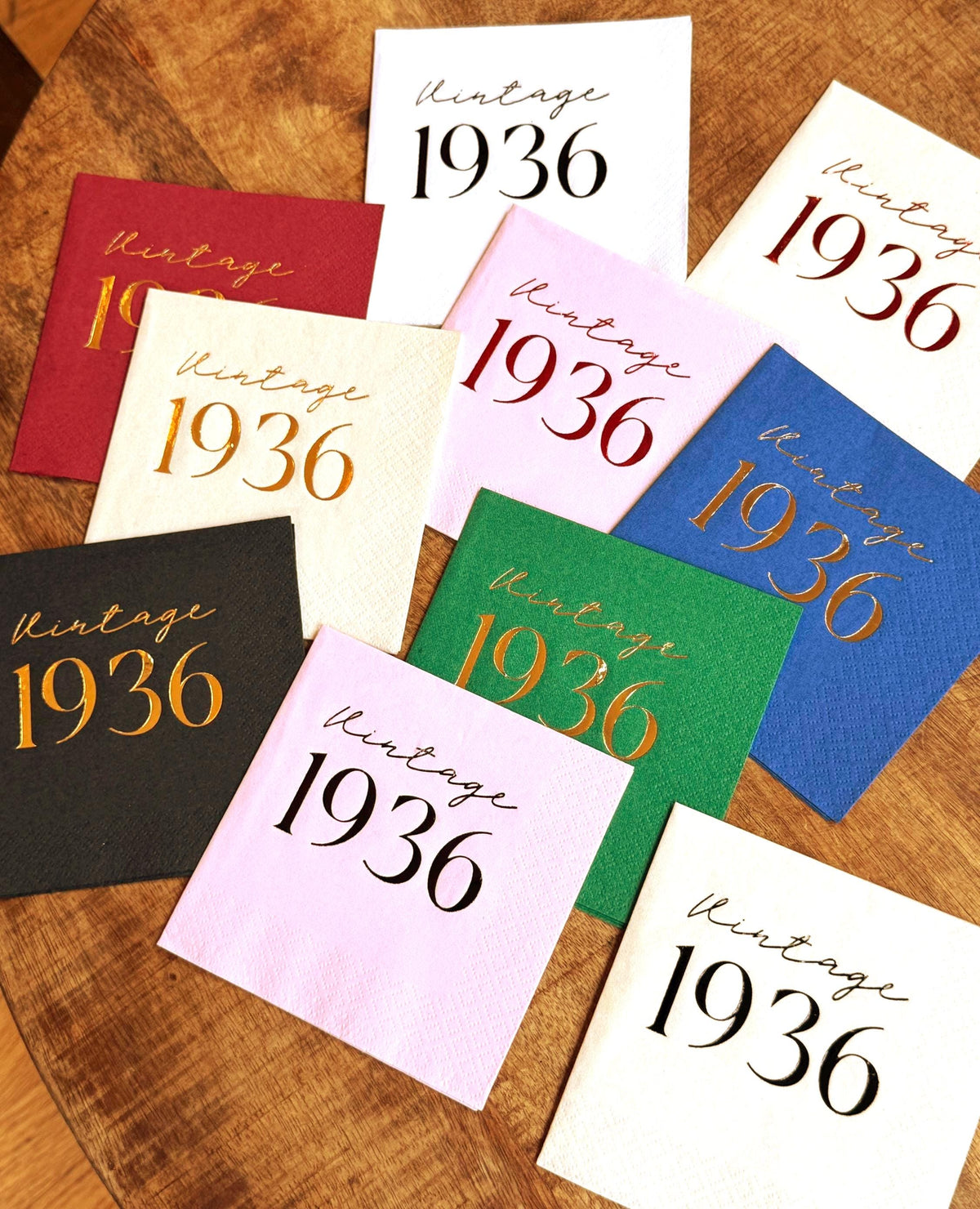 Vintage 1936 gold foil cocktail napkins for elegant birthday party tables