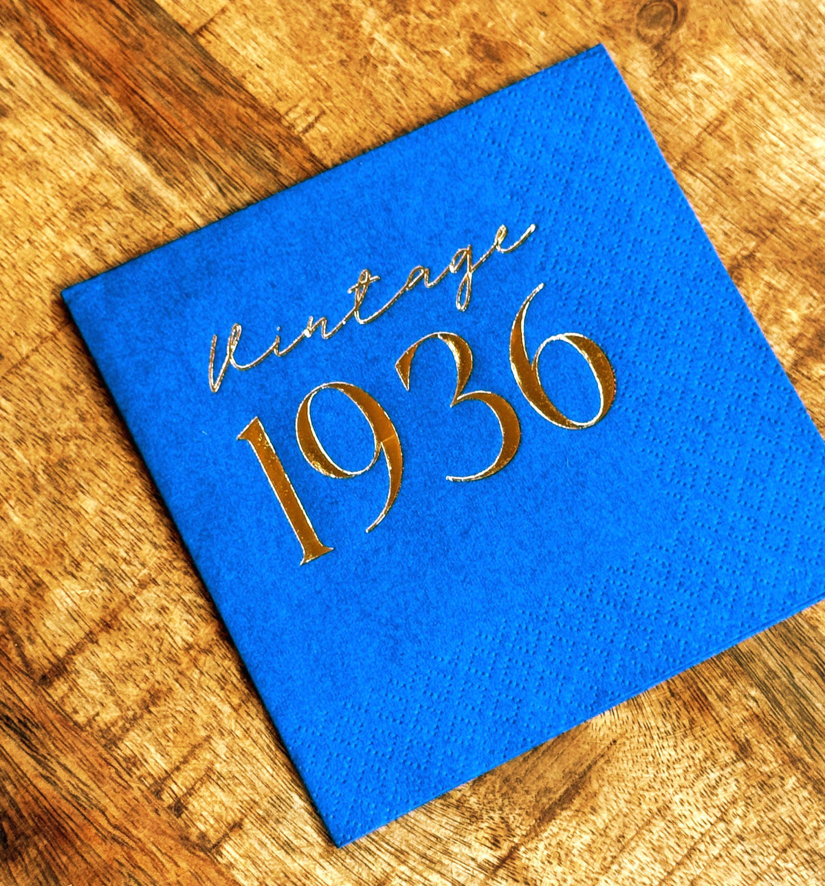 Vintage 1936 foil napkins for 90th birthday milestone celebration.  Navy Blue with gold foil